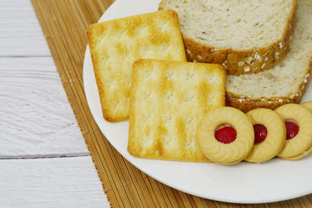 snack cookies image on white wooden backgroundの写真素材