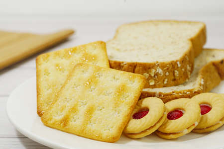 snack cookies image on white wooden backgroundの写真素材