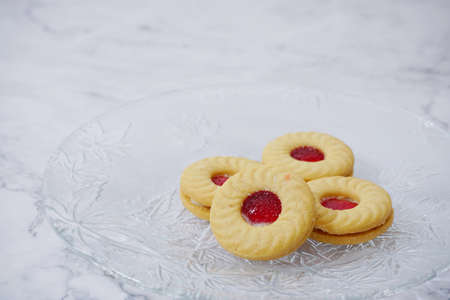 picture of snack cookies on a glass plateの写真素材