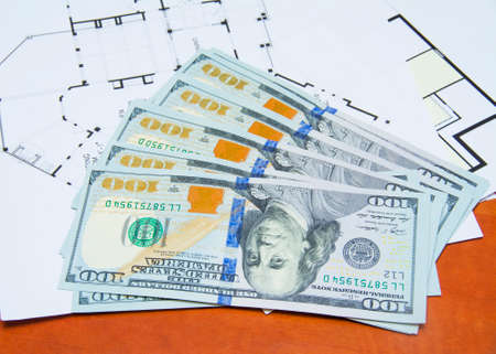 Money on house planの写真素材