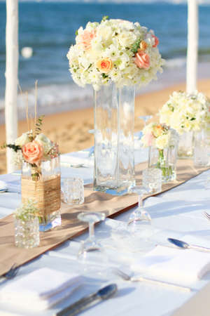 Wedding ceremony dining place on a tropical beach, Thailandの写真素材