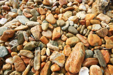 Pebbles on the coast, cleaned and polished by the wear of the seaの写真素材