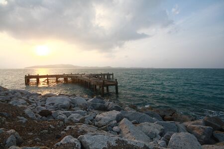 Sunset on the old concrete jetty in nateral park