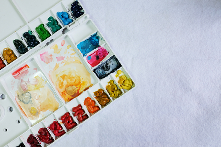 Set of watercolor paints art brushes on white backgroundの写真素材