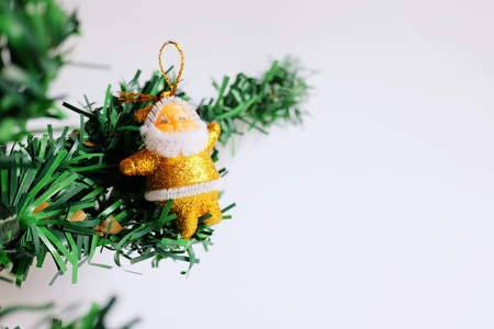 Pine cone with Christmas decoration isolated on white backgroundの写真素材