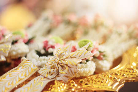 Flower garlands on a gold tray in tradition Thai wedding ceremony day. Jasmine garland.の写真素材