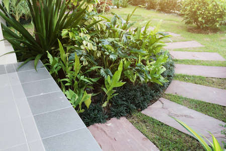 Idea of Stone and cement tile design for paving walkway in the garden. Design And Decorative Garden.