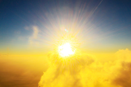 Golden light with sunrise in morning on the sky and cloud .Fog cover the jungle hill in Thailand