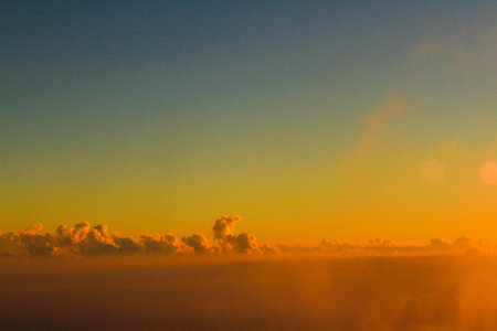 Golden light with sunrise in morning on the sky and clound .Fog cover the jungle hill in Thailand