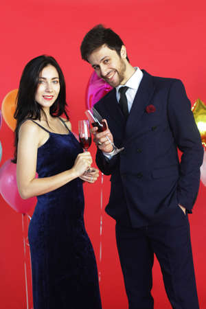 Sweet couple Love smile and spending Romantic with drinking wine in christmas time and celebrating...
