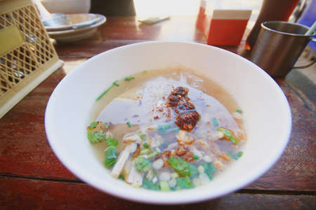 Delicious traditional Pork Spare Ribs Rice Noodles Soup.Vietnamese noodle soup in white bowl.