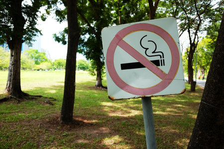 No smoking metal sign in the natural garden and parkの写真素材