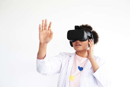 Smiling African doctor woman is relaxing with Virtual Reality glasses box. Student and pupil girl is...