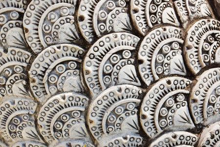 Details of the stucco carving of the Naga are a reflection of the faith in Buddhism and the gods of...