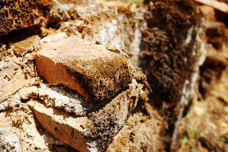 Close up ancient brick ruins of the temple in Thailandの写真素材