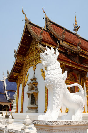Lion statue stucco carvings decorated at Ancient pagoda of buddhism in Thailand