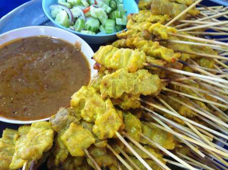 Thai style grilled pork with sweet peanut sauce.の素材