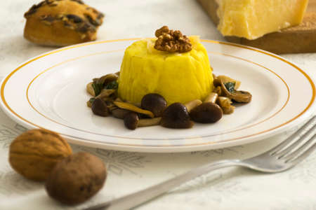 Italian Grana cheese flan with chanterelle mushroomsの写真素材