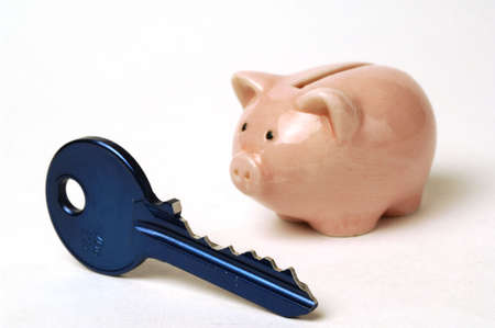 piggy bank and keyの写真素材