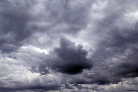 Summer sky with big grey clouds