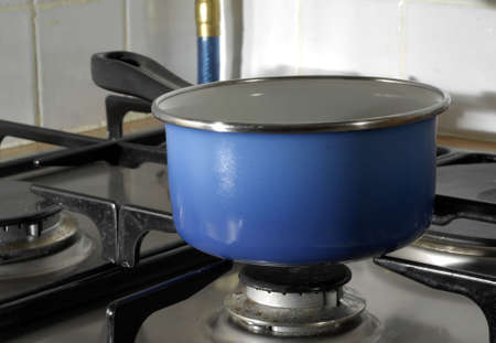 blue casserole in kitchenの写真素材