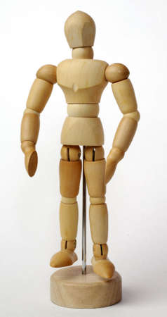 wooden figurine isolated on white backgroundの写真素材