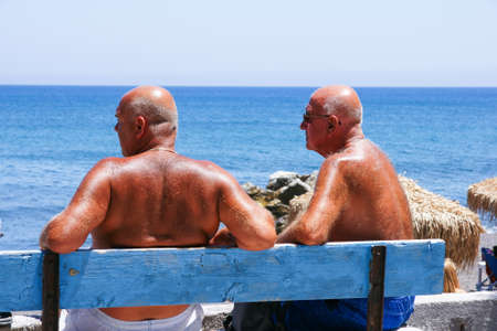 Sunbathing on the beach of Santorini islandのeditorial素材