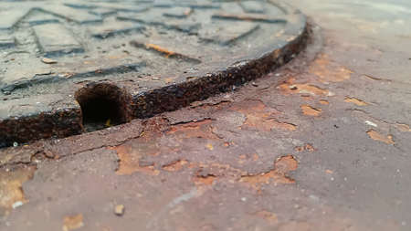 Low view Focus old rust beside the sewer pipe.の写真素材