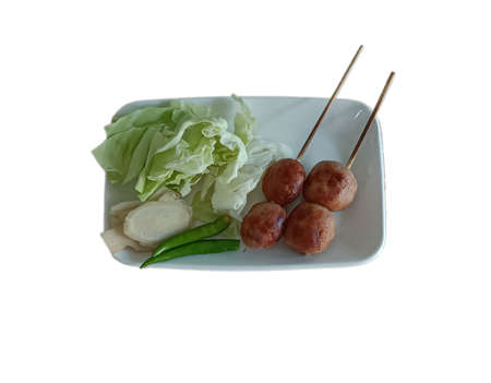 Isaan sausage and vegetable ,thai food on white backgroudの写真素材