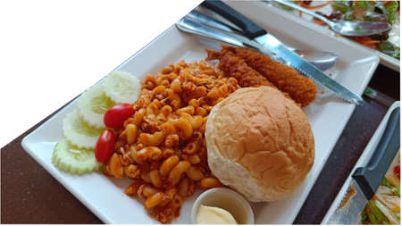Focus Macaroni with Tomato Sauce with shrimp fried eat with breadの写真素材