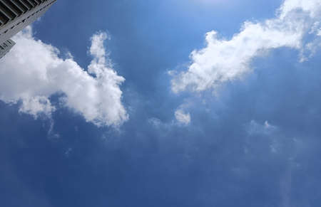 Sky and clouds building beautiful daytime backgroundの写真素材