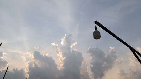 Light bulb and sky background clouds sunlightの写真素材