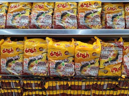 Nonthaburi, Thailand - April 20, 2022: Popular thai instant noodle MAMA for sale on a convenience...