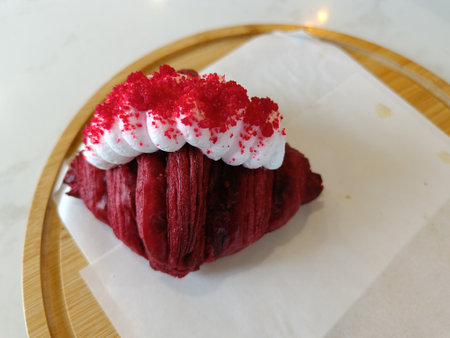 Red Velvet Croissant on the wood plateの写真素材