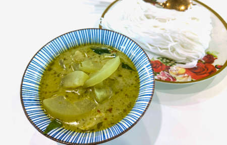 Homemade green curry with chicken and green pumpkin. Spicy flavor. Popular Thai food.