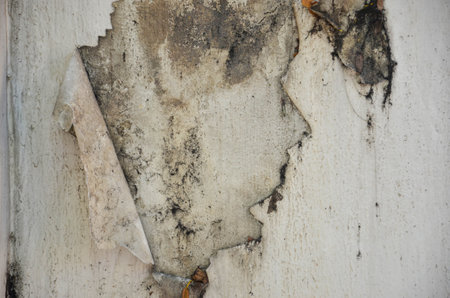 Closeup of peeling painted old wall