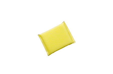 sponge for washing dishes, yellow sponge have net covering the sponge isolated on white background with clipping pathの写真素材