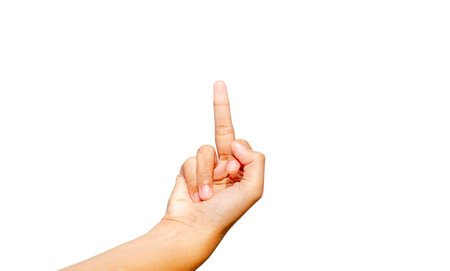 Female hand showing middle finger or fuck you isolated on white background with clipping pathの写真素材