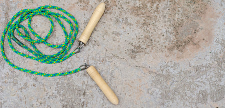 Jumping rope on cement floor background with copy space, Top view, health care concept. Bannerの写真素材