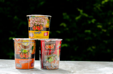 Nonthaburi, Thailand - September 15, 2023: Mama Set is noodles cup with Tom Yum Shrimp and Minced Pork Flavor. Mama is a popular brand in Thailand. Copy spaceのeditorial素材