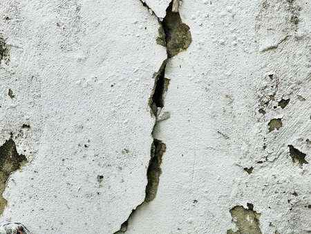 concrete wall cracked due to an earthquake.