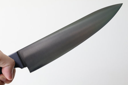 Hand holding basic chef knife, Kitchen knives for cooking