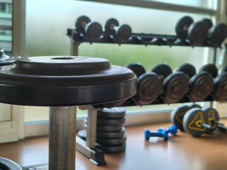 Dumbbells on a gym. ready for free weight training, with copy space.の写真素材