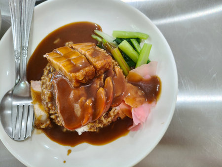 Top view of red pork and crispy pork rice on the table, a delicious Thai dish. with copy spaceの写真素材
