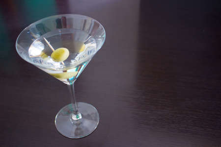 Martini cocktail on a dark table
