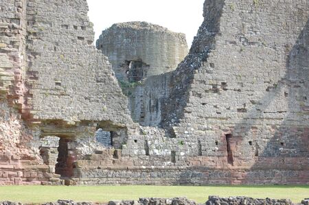a general full castle scene view, walls and grassの写真素材