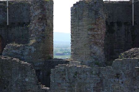 a high contrast shot through a castle wall                     の写真素材
