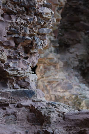 a closeup of a rock wall of a castle        の写真素材