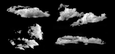 Black background with several white clouds. Set for design of banners and collages with nature and natural subjects. Abstract brushes of steam cloud.の写真素材