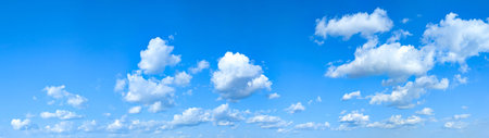 Wide detailed panorama of the sky with a large number of clouds. Spacious summer clear space with...